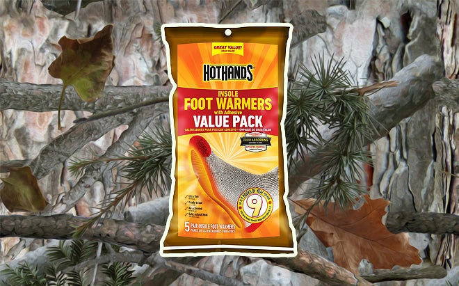 HotHands insole foot warmers with adhesive five-pair value pack on realistic 3D forest camo background