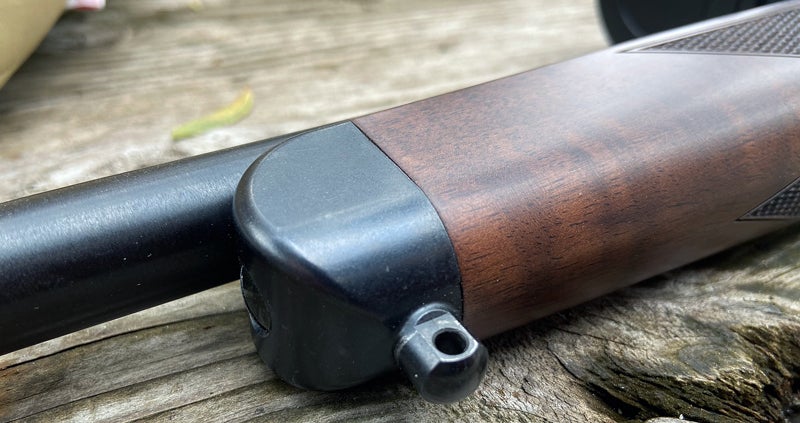 Front sling stud is attached to the blued steel forend cap. (Photo © Russ Chastain)