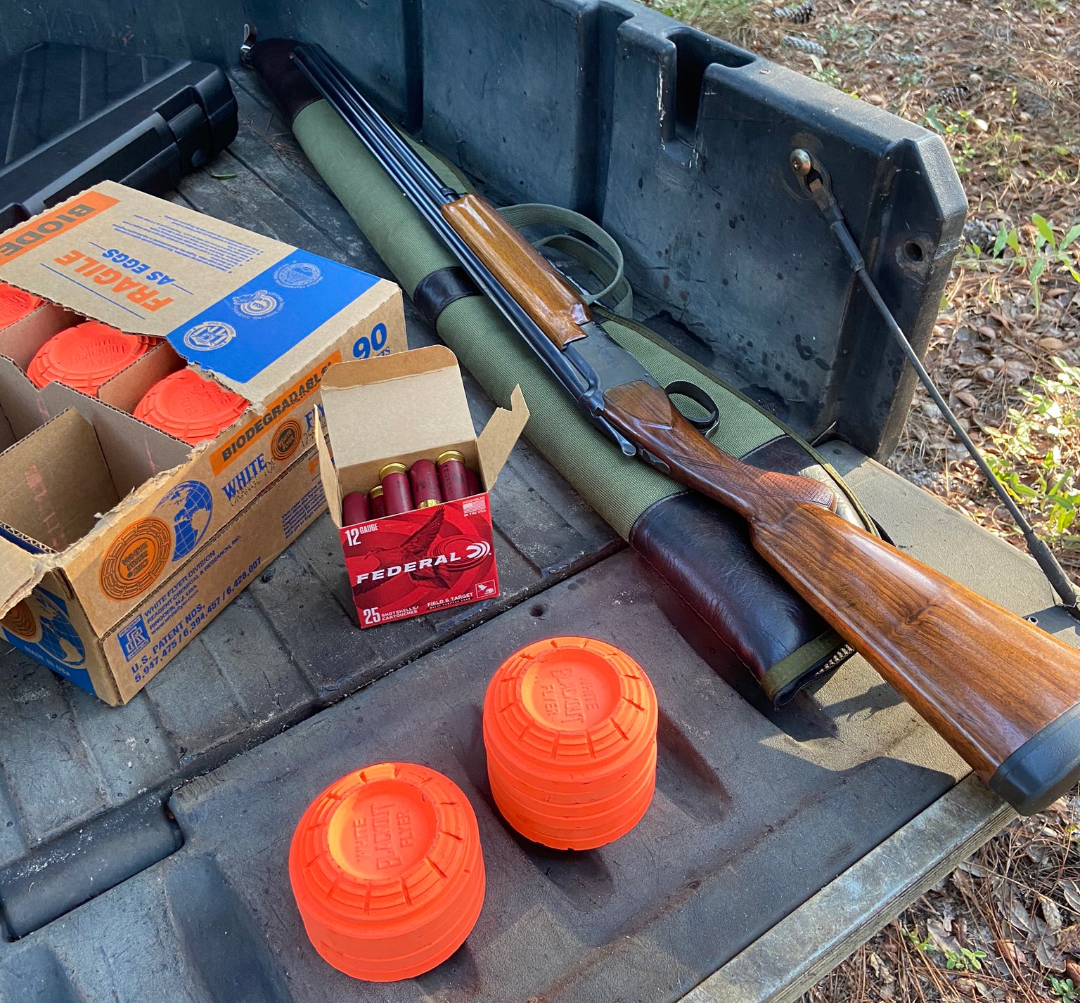 Some clays, some shells, and my favorite old shotgun. (Photo © Russ Chastain)